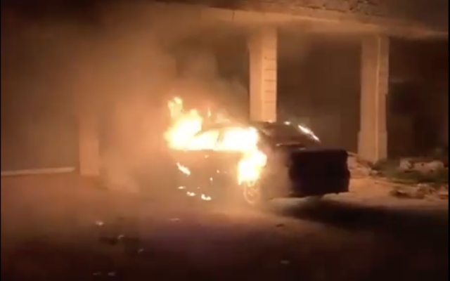 Footage of a car burning in a reported settler attack in the Palestinian West Bank village of Turmus Ayya, April 18, 2026. (Screenshot/X, used in accordance with Clause 27a of the Copyright Law)